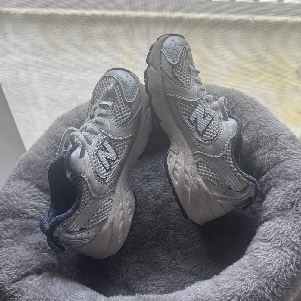 New Balance Silver and Black Athletic Shoes